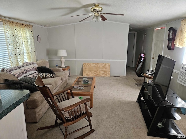 120 E 1st St, Bonnie, IL 62816 - living area featuring ceiling fan, light carpet, and ornamental molding