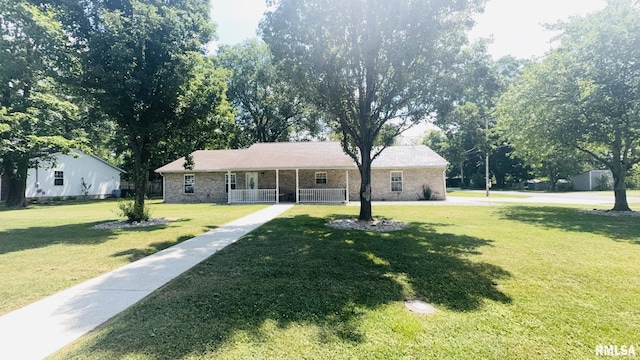 902 N Buchanan St, Benton, IL 62812 - ranch-style house featuring a porch and a front lawn