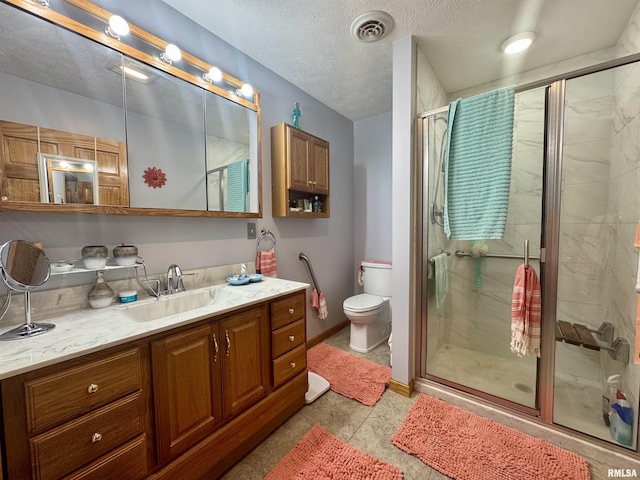 902 N Buchanan St, Benton, IL 62812 - full bath with vanity, a shower stall, and a textured ceiling