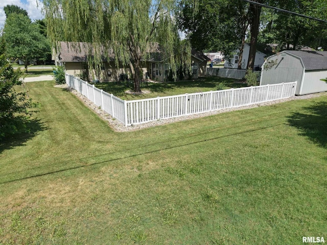 902 N Buchanan St, Benton, IL 62812 - fenced backyard featuring a storage unit