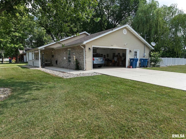 902 N Buchanan St, Benton, IL 62812 - view of home's exterior with a garage and concrete driveway