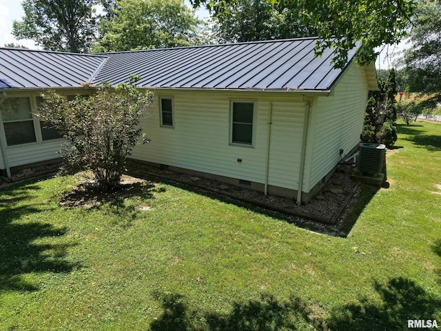 13919 Hamilton Pike Rd, Whittington, IL 62897 - view of side of home featuring a standing seam roof, a metal roof, a yard, and crawl space