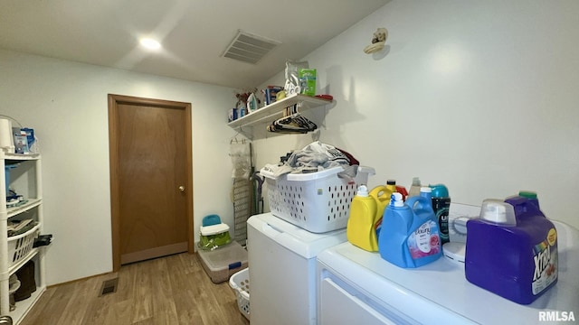 13919 Hamilton Pike Rd, Whittington, IL 62897 - laundry room with washer and dryer and light wood-style floors