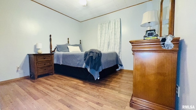 13919 Hamilton Pike Rd, Whittington, IL 62897 - bedroom featuring light wood finished floors and ornamental molding