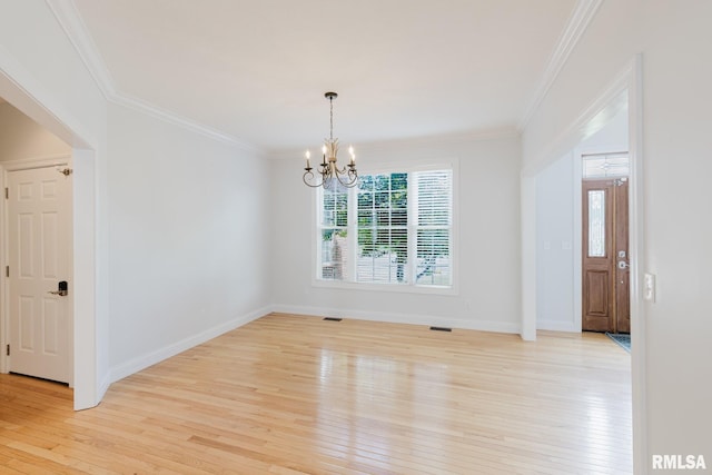 1506 Gleneagle Dr, Marion, IL 62959 - unfurnished room with light wood-type flooring, a chandelier, and crown molding