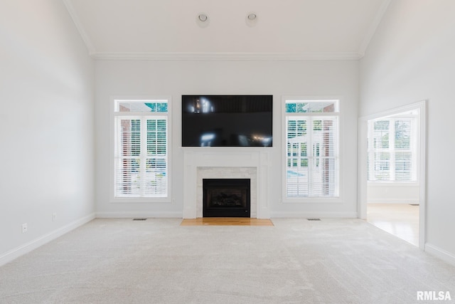 1506 Gleneagle Dr, Marion, IL 62959 - unfurnished living room featuring crown molding, carpet floors, and a fireplace with flush hearth