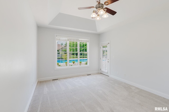1506 Gleneagle Dr, Marion, IL 62959 - carpeted empty room featuring ceiling fan and a raised ceiling