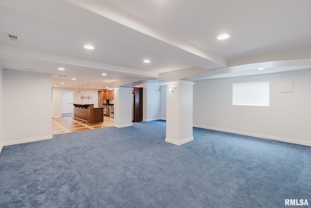 1506 Gleneagle Dr, Marion, IL 62959 - below grade area with bar with sink, recessed lighting, light colored carpet, and arched walkways