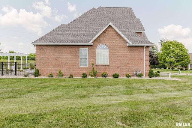 1506 Gleneagle Dr, Marion, IL 62959 - view of home's exterior featuring roof with shingles, a pergola, and brick siding