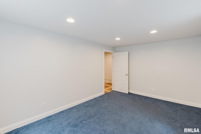 1506 Gleneagle Dr, Marion, IL 62959 - empty room featuring dark colored carpet and recessed lighting