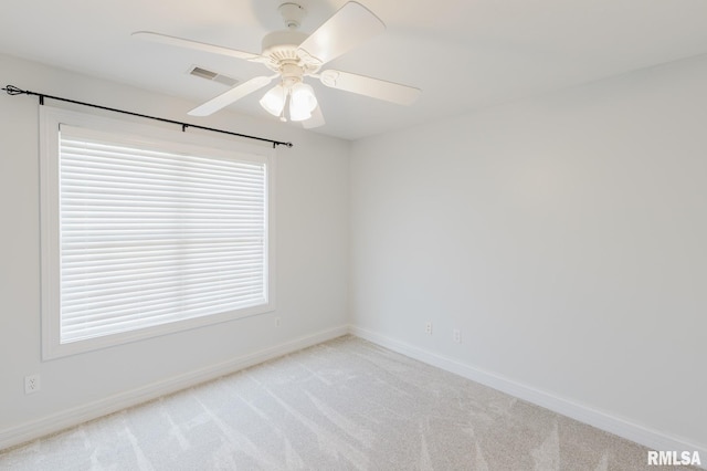 1506 Gleneagle Dr, Marion, IL 62959 - spare room featuring light colored carpet and ceiling fan