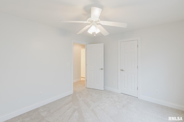 1506 Gleneagle Dr, Marion, IL 62959 - unfurnished bedroom featuring light carpet and a ceiling fan