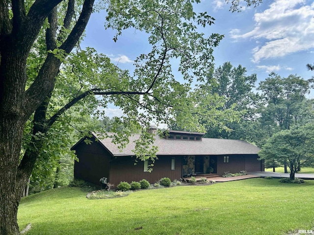 304 May Apple Ln, Carbondale, IL 62903 - view of front of property with a front lawn, a garage, and a shingled roof
