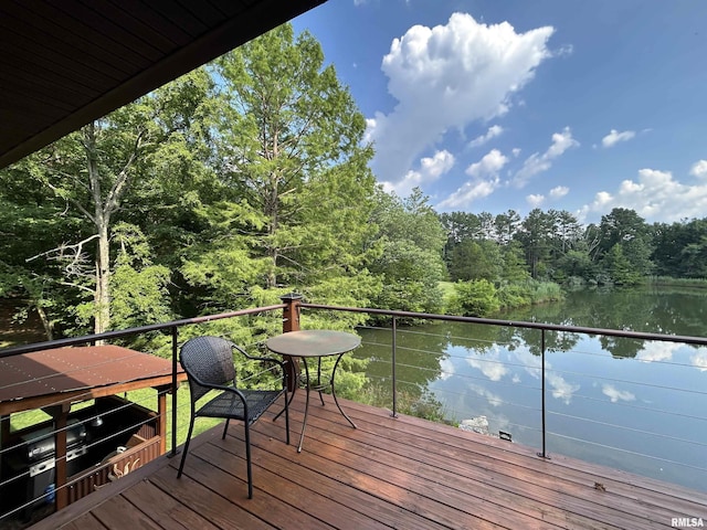 304 May Apple Ln, Carbondale, IL 62903 - wooden terrace featuring a water view and a wooded view