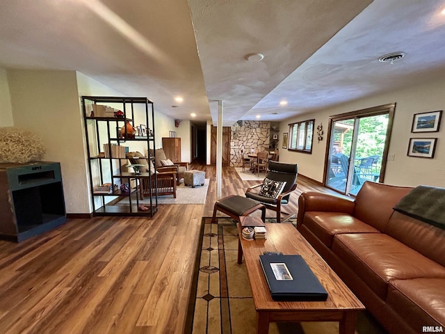 304 May Apple Ln, Carbondale, IL 62903 - living area with wood finished floors, a fireplace, and recessed lighting