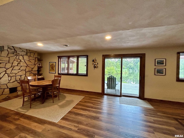 304 May Apple Ln, Carbondale, IL 62903 - dining room with wood finished floors, a textured ceiling, and recessed lighting