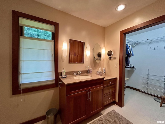 304 May Apple Ln, Carbondale, IL 62903 - bathroom featuring vanity and a spacious closet