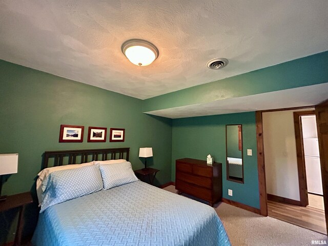 304 May Apple Ln, Carbondale, IL 62903 - carpeted bedroom featuring baseboards and a textured ceiling