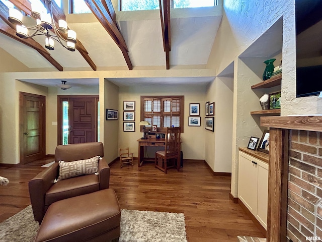 304 May Apple Ln, Carbondale, IL 62903 - living area featuring healthy amount of natural light, wood finished floors, and a chandelier