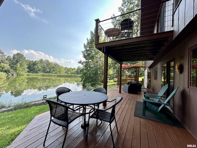 304 May Apple Ln, Carbondale, IL 62903 - wooden terrace with a water view and outdoor dining space
