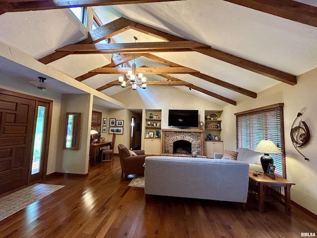 304 May Apple Ln, Carbondale, IL 62903 - living room with a chandelier, a fireplace, dark wood finished floors, and built in features