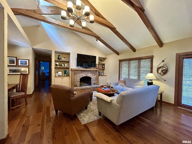 304 May Apple Ln, Carbondale, IL 62903 - living room with a chandelier, beam ceiling, high vaulted ceiling, a fireplace, and dark wood-type flooring