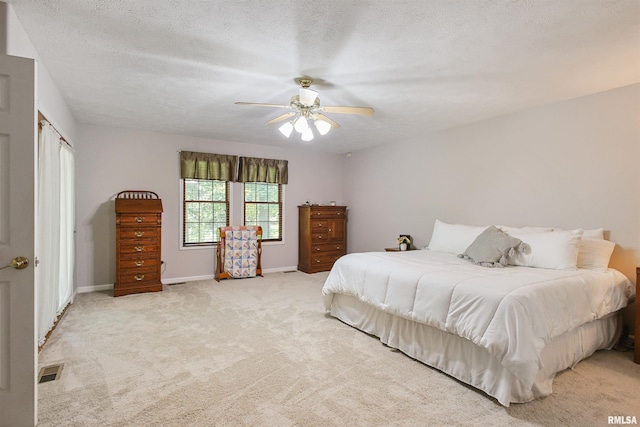 1818 Calico Rd, Marion, IL 62959 - bedroom with light colored carpet, ceiling fan, and a textured ceiling