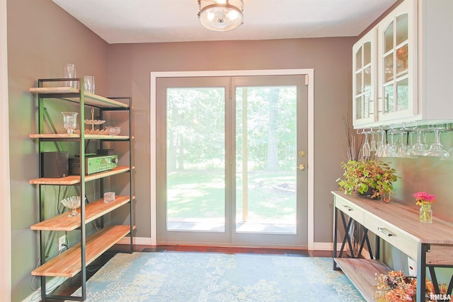 1818 Calico Rd, Marion, IL 62959 - doorway to outside with baseboards and wood finished floors