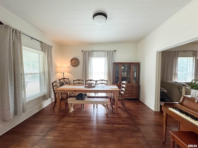 817 W Hendrickson St, Marion, IL 62959 - dining area featuring ornamental molding and dark wood-type flooring