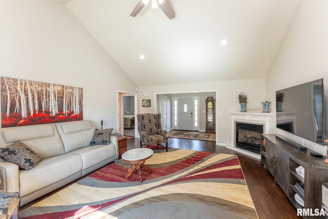 1600 S Eugene Ln, Marion, IL 62959 - living room featuring high vaulted ceiling, dark wood-style flooring, a glass covered fireplace, a ceiling fan, and recessed lighting