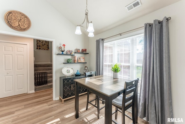 1600 S Eugene Ln, Marion, IL 62959 - dining space with stairway, light wood-style floors, and vaulted ceiling