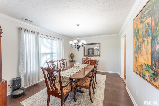 1600 S Eugene Ln, Marion, IL 62959 - dining area with a chandelier, dark wood-style flooring, ornamental molding, and a textured ceiling