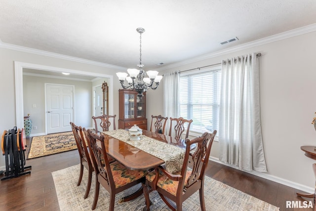 1600 S Eugene Ln, Marion, IL 62959 - dining space featuring a chandelier, dark wood-style floors, and crown molding
