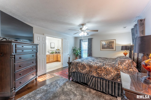 1600 S Eugene Ln, Marion, IL 62959 - bedroom featuring dark wood-type flooring, ornamental molding, ceiling fan, and ensuite bathroom