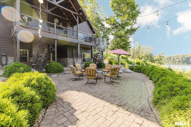 3525 Parrish Ridge Ln, Goreville, IL 62939 - view of patio / terrace with stairs and a water view