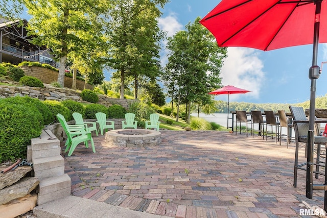 3525 Parrish Ridge Ln, Goreville, IL 62939 - view of patio featuring an outdoor fire pit