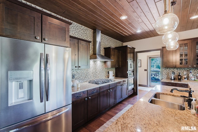 3525 Parrish Ridge Ln, Goreville, IL 62939 - kitchen with appliances with stainless steel finishes, wall chimney exhaust hood, wooden ceiling, tasteful backsplash, and dark wood-style flooring