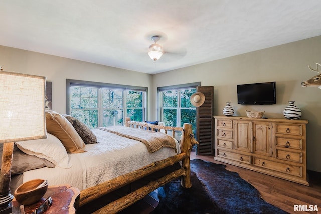 3525 Parrish Ridge Ln, Goreville, IL 62939 - bedroom featuring multiple windows, wood finished floors, and ceiling fan