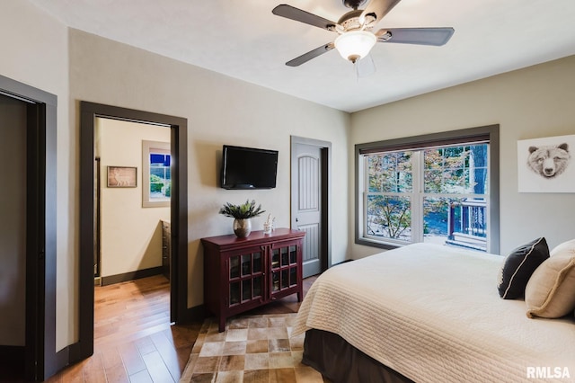 3525 Parrish Ridge Ln, Goreville, IL 62939 - bedroom with light wood-type flooring, a ceiling fan, and a closet