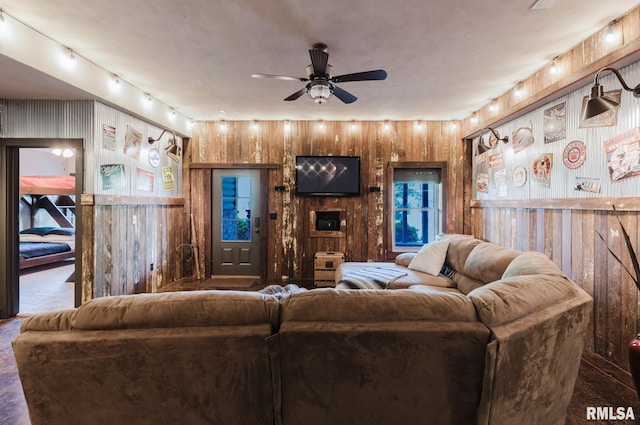 3525 Parrish Ridge Ln, Goreville, IL 62939 - living room with ceiling fan, wooden walls, track lighting, and carpet