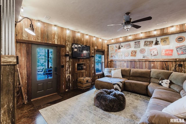 3525 Parrish Ridge Ln, Goreville, IL 62939 - living area featuring wood walls and a ceiling fan