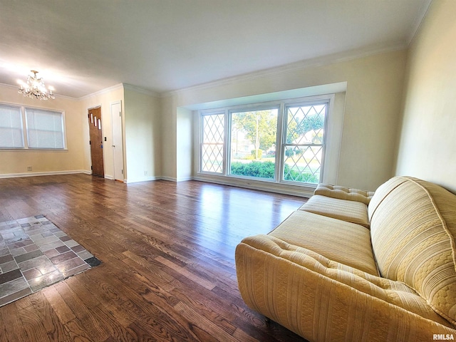 119 S 6th St SE, Clay City, IL 62824 - living area with a chandelier, ornamental molding, and wood finished floors