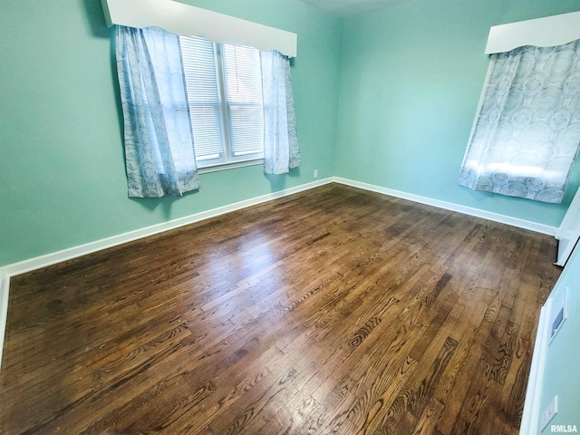 119 S 6th St SE, Clay City, IL 62824 - empty room featuring dark wood-type flooring
