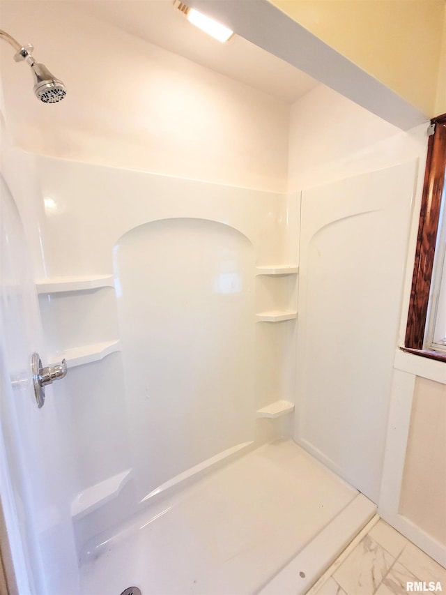 119 S 6th St SE, Clay City, IL 62824 - full bath with a shower and marble look tiles