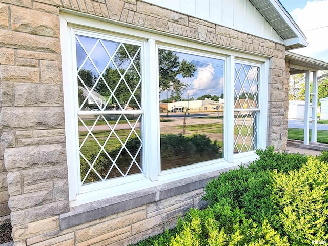 119 S 6th St SE, Clay City, IL 62824 - exterior view of stone siding and board and batten siding
