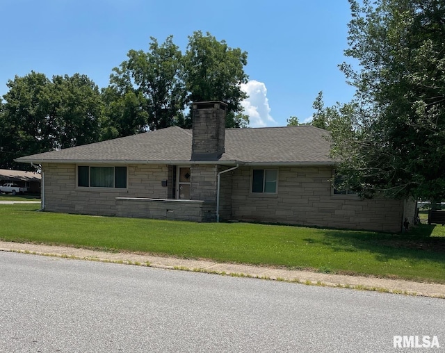 303 S College Blvd, Carmi, IL 62821 - view of front facade featuring stone siding, a front lawn, a shingled roof, and a chimney