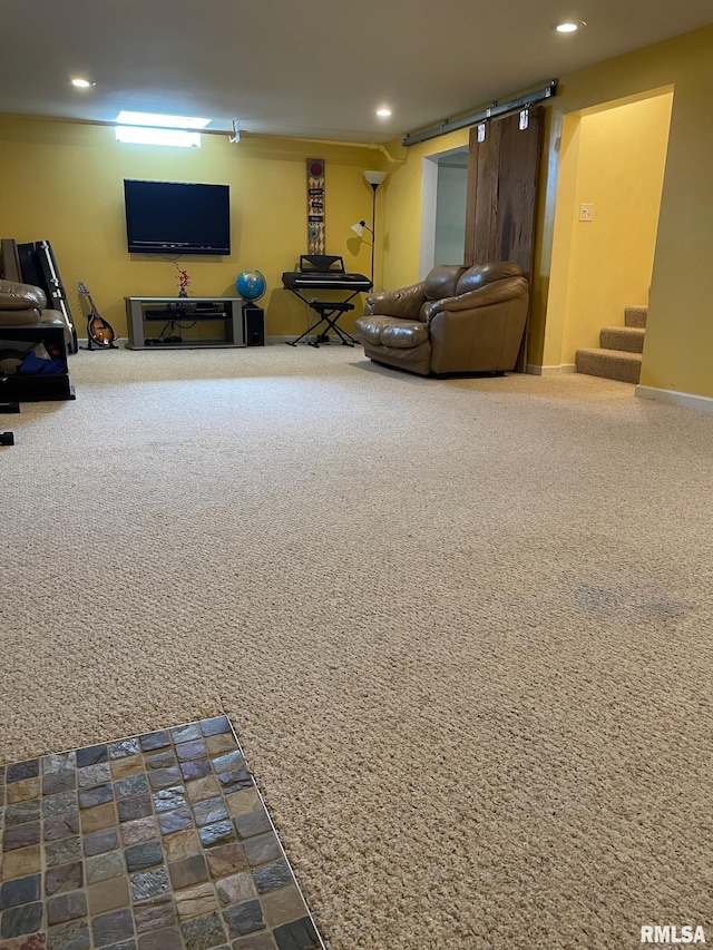 303 S College Blvd, Carmi, IL 62821 - living area with a barn door, dark colored carpet, stairs, and recessed lighting