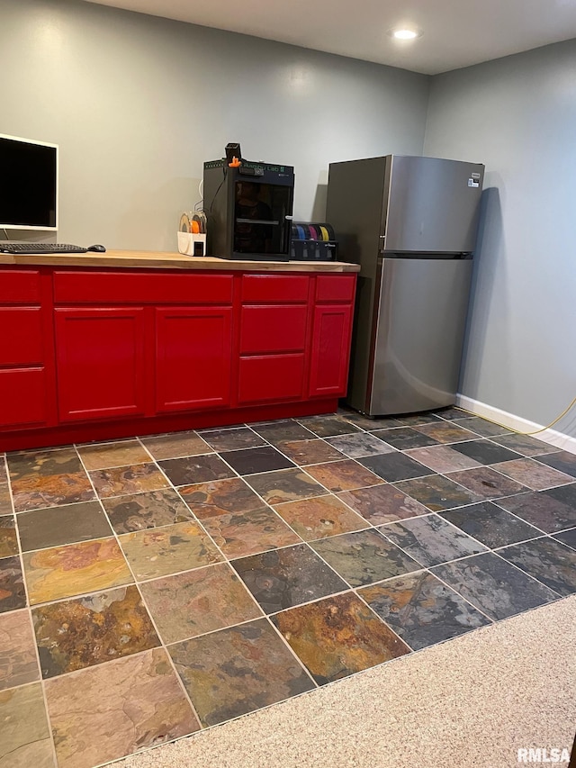 303 S College Blvd, Carmi, IL 62821 - miscellaneous room featuring stone tile floors and recessed lighting