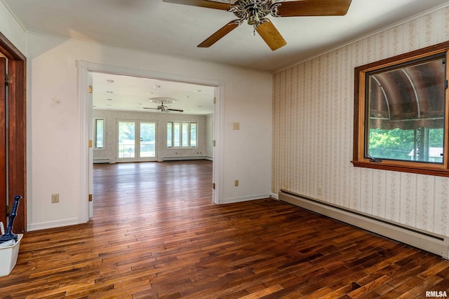 2723 Country Club Rd, Carbondale, IL 62901 - spare room with baseboard heating, hardwood / wood-style floors, crown molding, and a ceiling fan