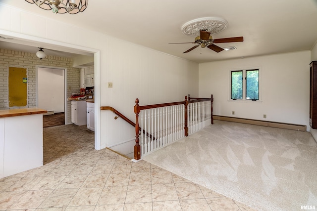 2723 Country Club Rd, Carbondale, IL 62901 - unfurnished room featuring a baseboard radiator and a ceiling fan